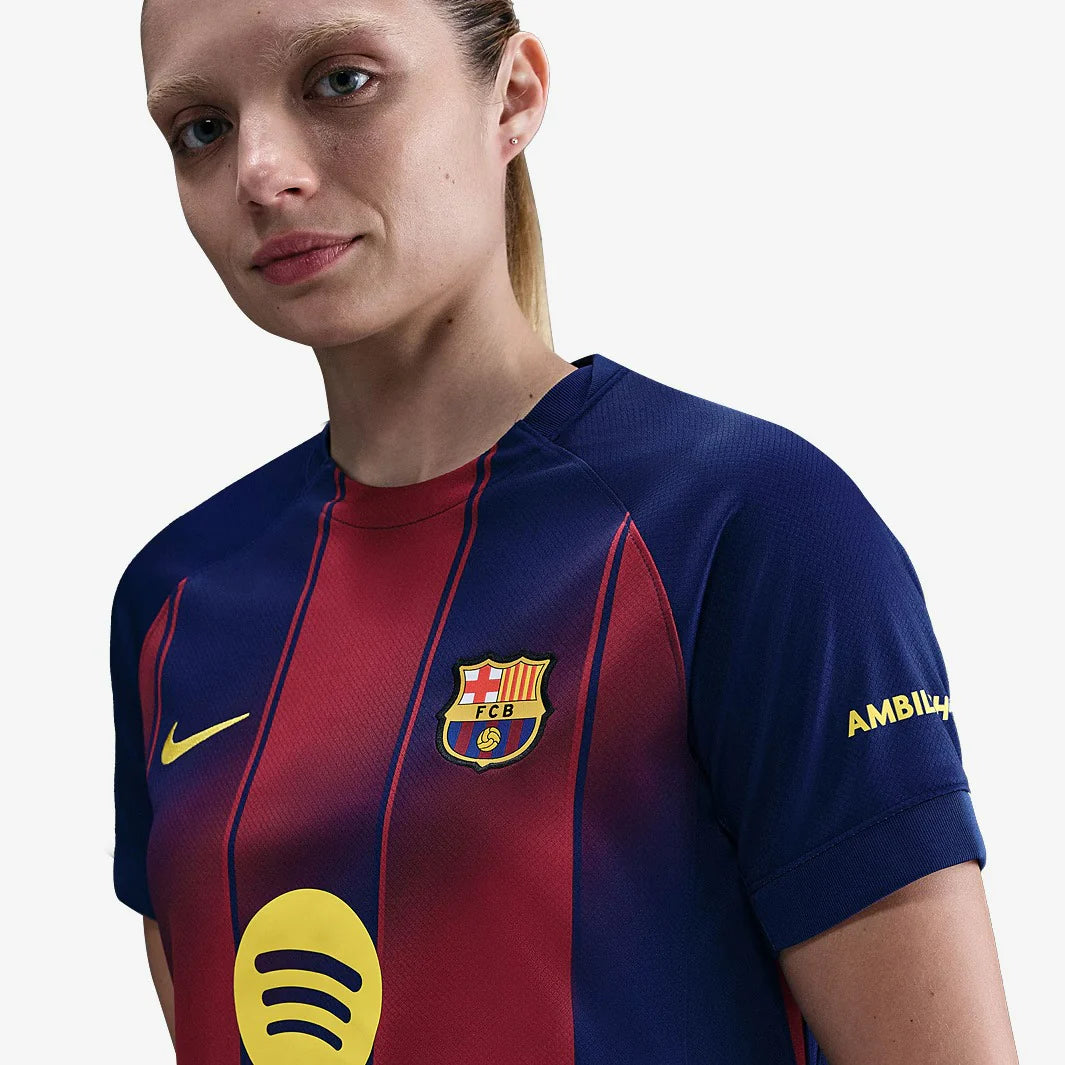 CAMISA FEMININA NIKE BARCELONA 2025/26 I TORCEDOR