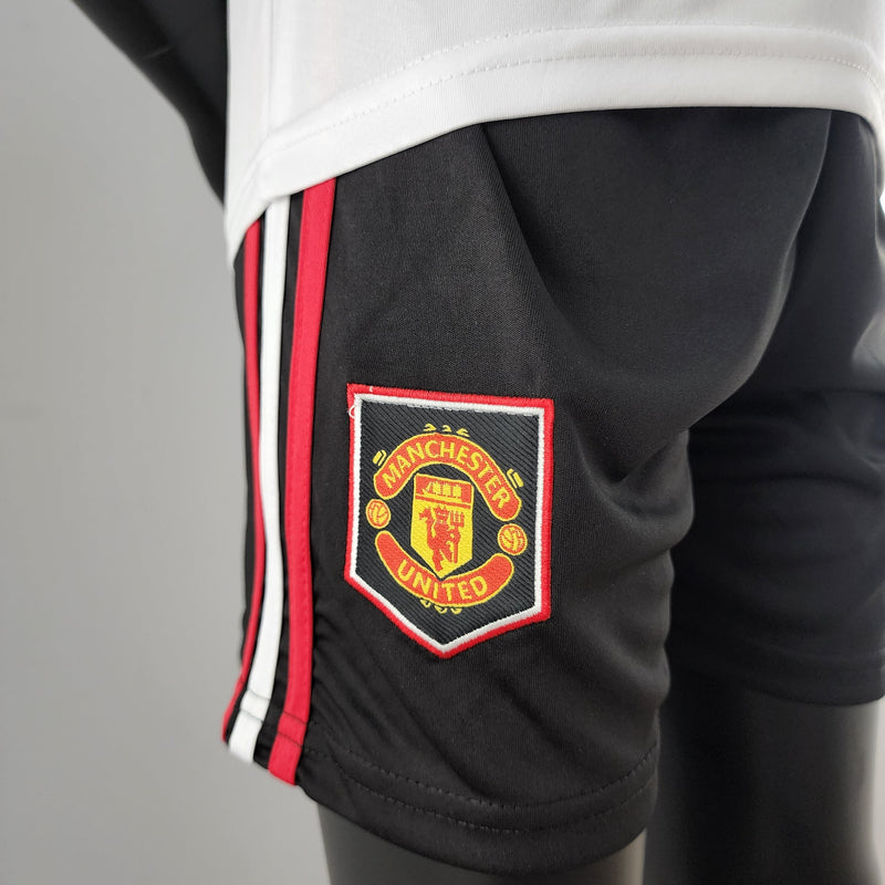 Kit Infantil Manchester United Reserva 22/23